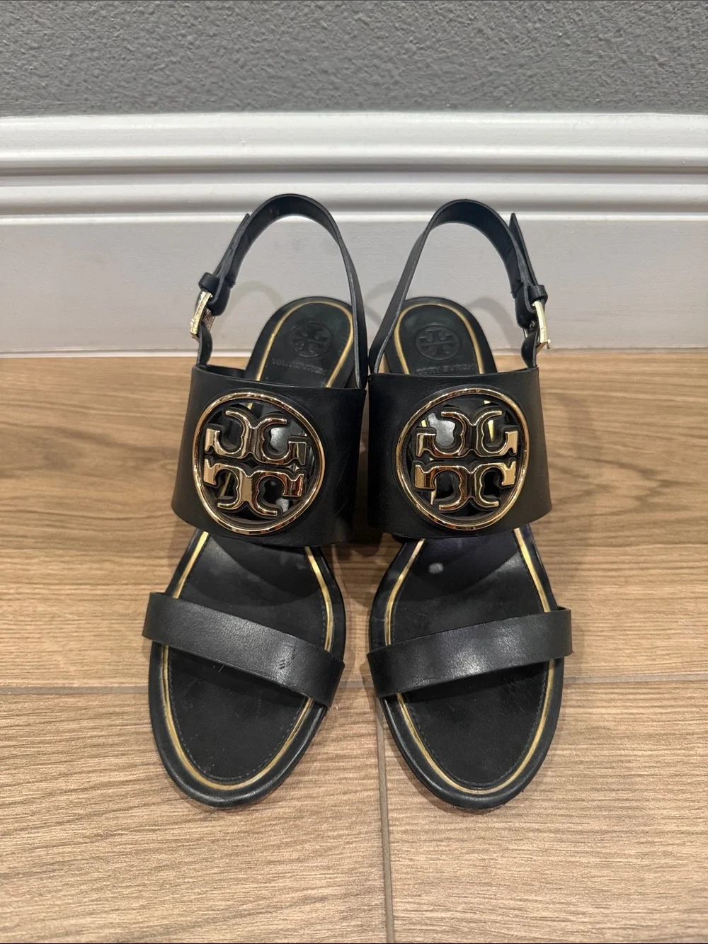 Tory Burch Black Leather Wedge Sandals with Gold Logo Medallion